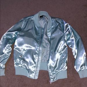Reflective teal jacket